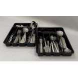 A suite of Viners stainless steel cutlery including dinner knives and forks, entree knives and