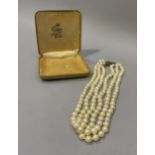 A cultured pearl necklace, the three rows of 6mm diameter pearls fastened with a marcasite set