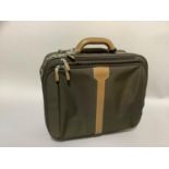 A Samsonite weekender bag in brown