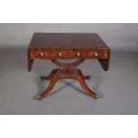 A LATE REGENCY FIGURED MAHOGANY AND EBONY LINE INLAID SOFA TABLE, having twin drop leaves with