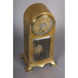 A SECESSIONIST MANTEL CLOCK, German sprung wound pendulum, with circular brass dial with raised