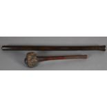 A FIJIAN HARDWOOD THROWING CLUB, with carved root ball head, tapered shaft and zig zag carved