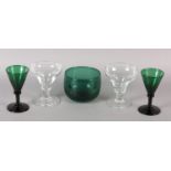 A PAIR OF EARLY 19TH CENTURY EMERALD GLASS WINES WITH RINGED KNOP AND PONTIL 13cm high, together
