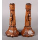 THOMPSON OF KILBURN 'MOUSEMAN', a pair of early oak candlesticks, c.1930s, of octagonal outline,