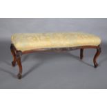 A MID 19TH CENTURY MAHOGANY STOOL of rectangular serpentine outline, upholstered seat, the moulded