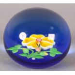 A FRENCH BACCARAT CRYSTAL PAPERWEIGHT 1983, single yellow flower and beetle, on blue, initialled B