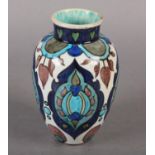 A BURMANTOFT FAIENCE ANGLO PERSIAN VASE BY LEONARD KING, painted with stylised plant forms and