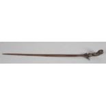 A MALAY KRIS with 22" long watered straight blade, foliate carved and pierced horn grip with