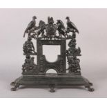A 19TH CENTURY CAST IRON HEARTH ORNAMENT in the form of a fireplace with coat of arms cresting,