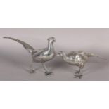 A PAIR OF PHEASANTS NATURALISTICALLY MODELLED IN .835 DUTCH SILVER, c.1920, each approximate 40cm