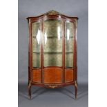 A LATE 19TH CENTURY FRENCH MAHOGANY, KINGWOOD AND GILT METAL MOUNTED VITRINE of arched outline,
