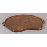 THOMPSON OF KILBURN 'MOUSEMAN', an early oak kidney shaped tray, c.1940s, with twin mouse handles