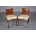 A PAIR OF FRENCH ART DECO FIGURED WALNUT SIDE CHAIRS, rectangular indented panel back, upholstered