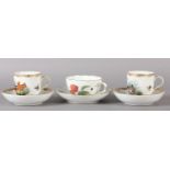 A PAIR OF KPM BERLIN PORCELAIN CABINET CUPS AND SAUCERS, writhen moulded with basket weave and