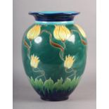 A BURMANTOFT FAIENCE VASE incised and enamelled with yellow flower heads and entwined stems from a