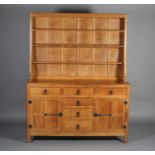 THOMPSON OF KILBURN 'MOUSEMAN', an oak dresser and rack c.1960's, having half-penny moulding to