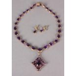 A SUITE OF MID VICTORIAN AMETHYST RIVIERE NECKLACE, PENDANT AND PENDANT EARRINGS in 9ct rose gold,