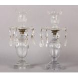 A PAIR OF 19TH CENTURY GLASS CANDLESTICKS the screw off sconces having scalloped rim and panel cut