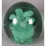 A 19TH CENTURY GREEN GLASS DUMP with flower pot inclusion, 9cm high