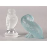 TWO LALIQUE SCULPTURES OF A DUCK IN PALE BLUE FROSTED GLASS AND ANOTHER BIRD IN FROSTED GLASS,
