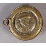AN EDWARD VII NOVELTY VESTA CASE of circular outline as a lifebuoy with the raised portrait of a