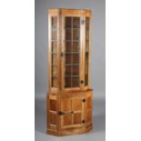 THOMPSON OF KILBURN 'MOUSEMAN', an oak corner standing cabinet c.1960's, having half-penny