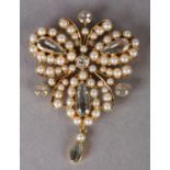 A VICTORIAN AQUAMARINE AND SEED PEARL BROOCH in 18ct gold, the three pear shaped faceted aquamarines