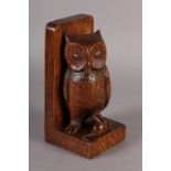 THOMPSON OF KILBURN 'MOUSEMAN', an early oak single bookend, c.1940s, carved as an owl holding a