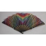 Ann Collier: The rainbow, a bobbin lace fan in bold colours, the design quite complex with several