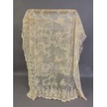 Antique Lace: A rectangular embroidered net wedding veil, worked with a light and airy spriggy