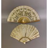 Two fans C 1900/1910, the first a small gold sequin fan, the leaf of gold lamé overlaid with cream