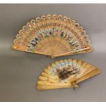 19th century light wood brisé fan with a transfer print of a winter scene showing impressive