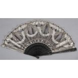 Lace and sequin fan c 1905, the white lace handmade and most likely Belgian, applied onto black net,