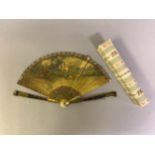 A 19th century Vernis Martin style brisé fan, the recto with a tender scene of a young courting