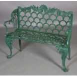 A green cast iron garden bench, with fan cresting, 105cm wide (some spindles missing from left