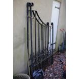 A pair of wrought iron driveway gates, 136cm x 200cm each