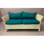 A Lloyd Loom sofa and pair of chairs, cushions in need of reupholstering, sofa 178cm wide x 85cm