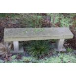 A pair of rectangular cast benches: 125cm x 28cm by 40cm high and 125cm x 23.5cm x 39cm