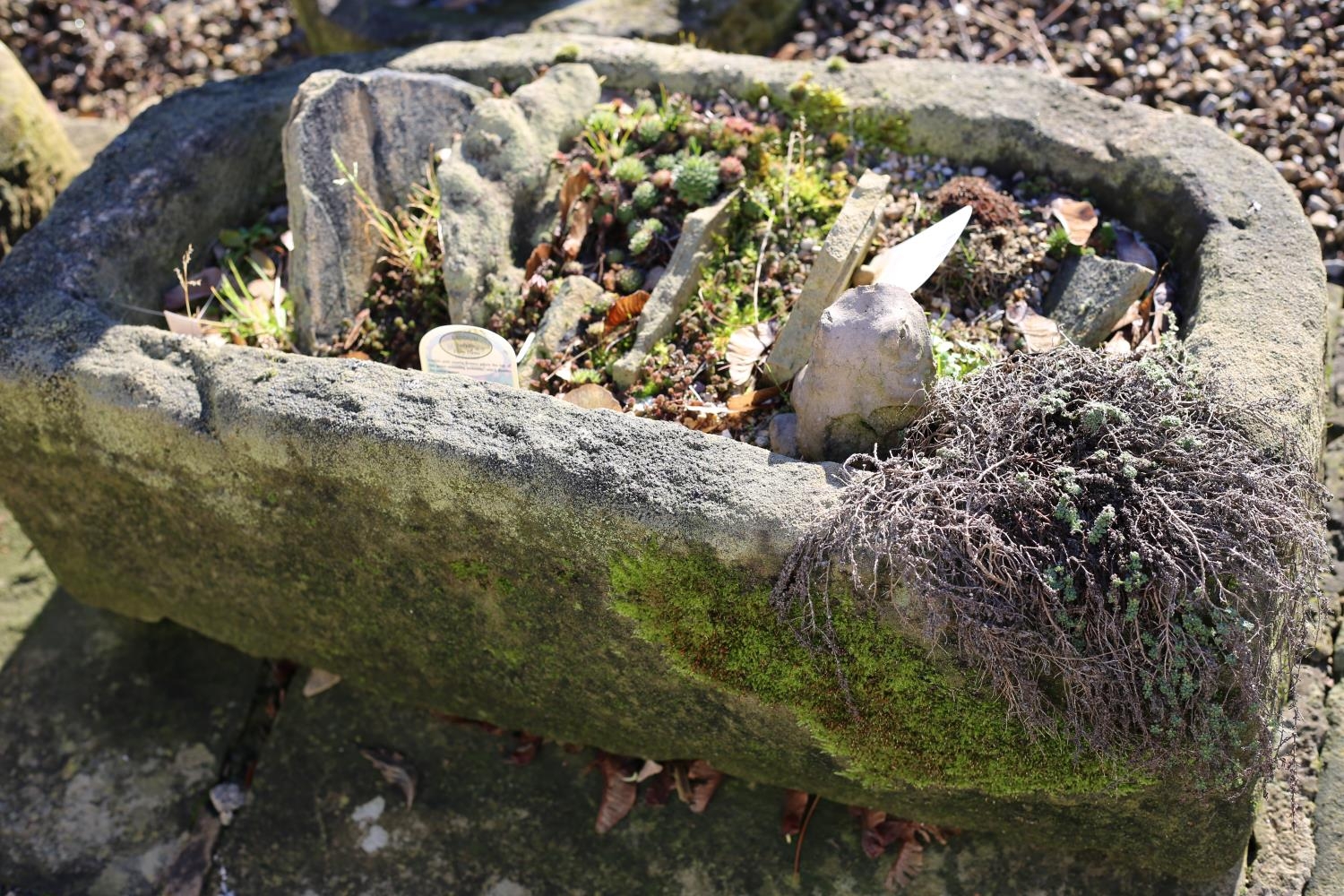 A semi-circular stone trough, flat back, 74cm x 43cm x 26cm - Image 4 of 4