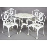 A white metal garden table and four chairs including two single chairs and two open armchairs, the