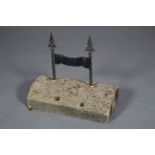 A Victorian wrought iron and Yorkshire stone book scraper, 54cm wide