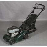 A Briggs & Stratton Hayter Harrier 41 petrol lawn mower, self propelled rotary with grass collector