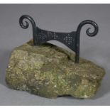 A wrought iron and Yorkshire stone boot scraper, 44cm wide