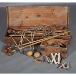 A Jaques & Son croquet set, in original wooden case, including eight mallets, eight balls, ten hoops