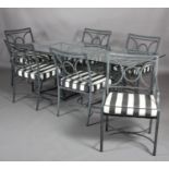 A Kettal of Barcelona garden dining suite, metal and glass topped dining table, rectangular, on