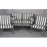 A Kettal of Barcelona metal garden sofa, pair of armchairs and coffee table, with black and white