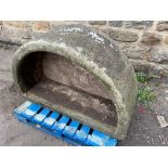 A Yorkshire stone trough of 'D' profile, 136cm wide at the back x 86cm deep x 52cm high