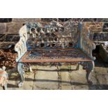 A wrought iron garden bench, painted blue, on cabriole legs, 108cm x 48cm x 86cm high