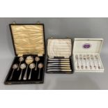 Cased set of six EPNS tea knives, box of cake forks and a case of six EPNS fruit spoons and a server