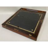 A 19th century rosewood and brass bound writing slope the interior fitted with leather writing